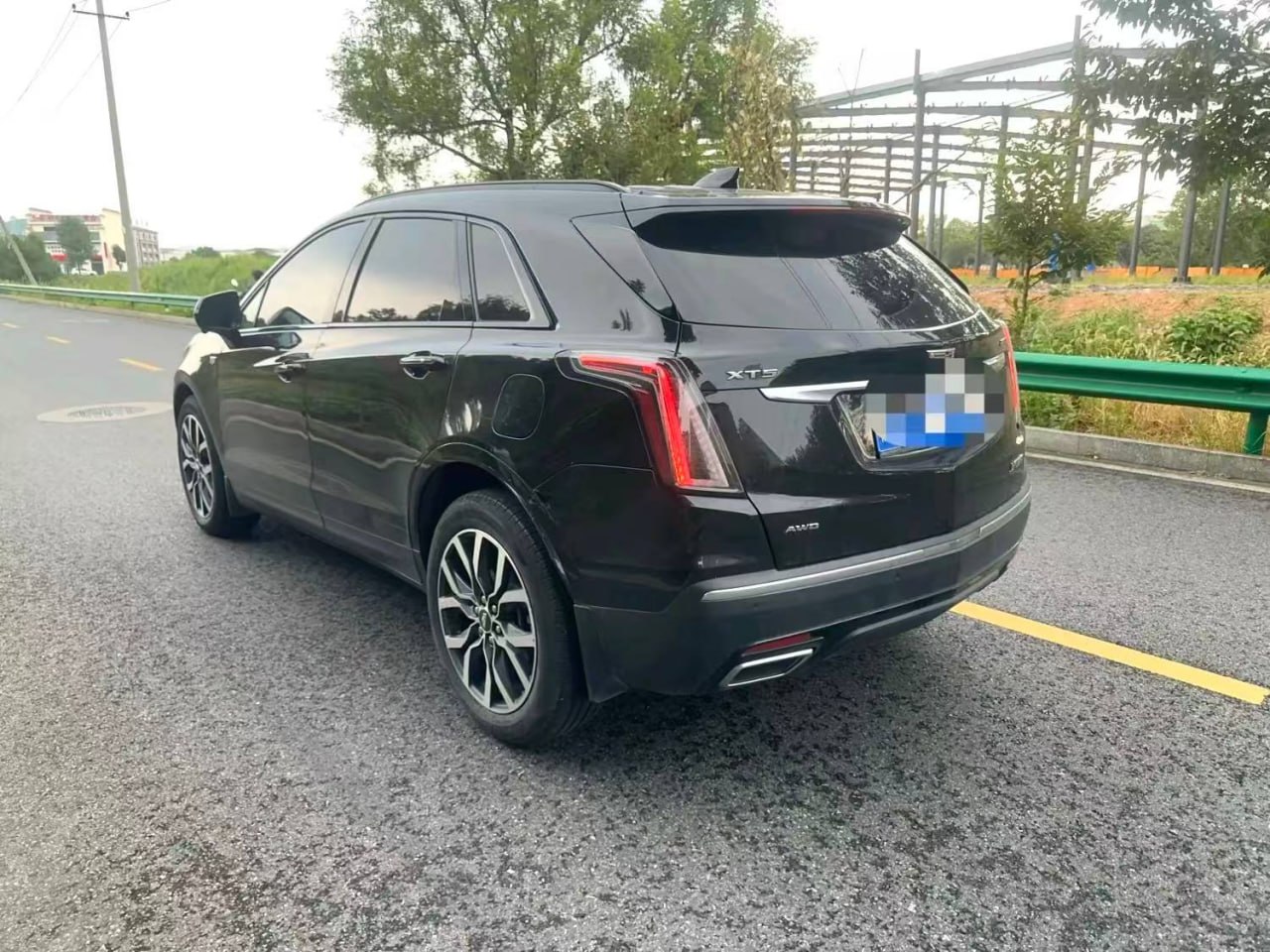 Cadillac XT5 — Вид сзади и слева