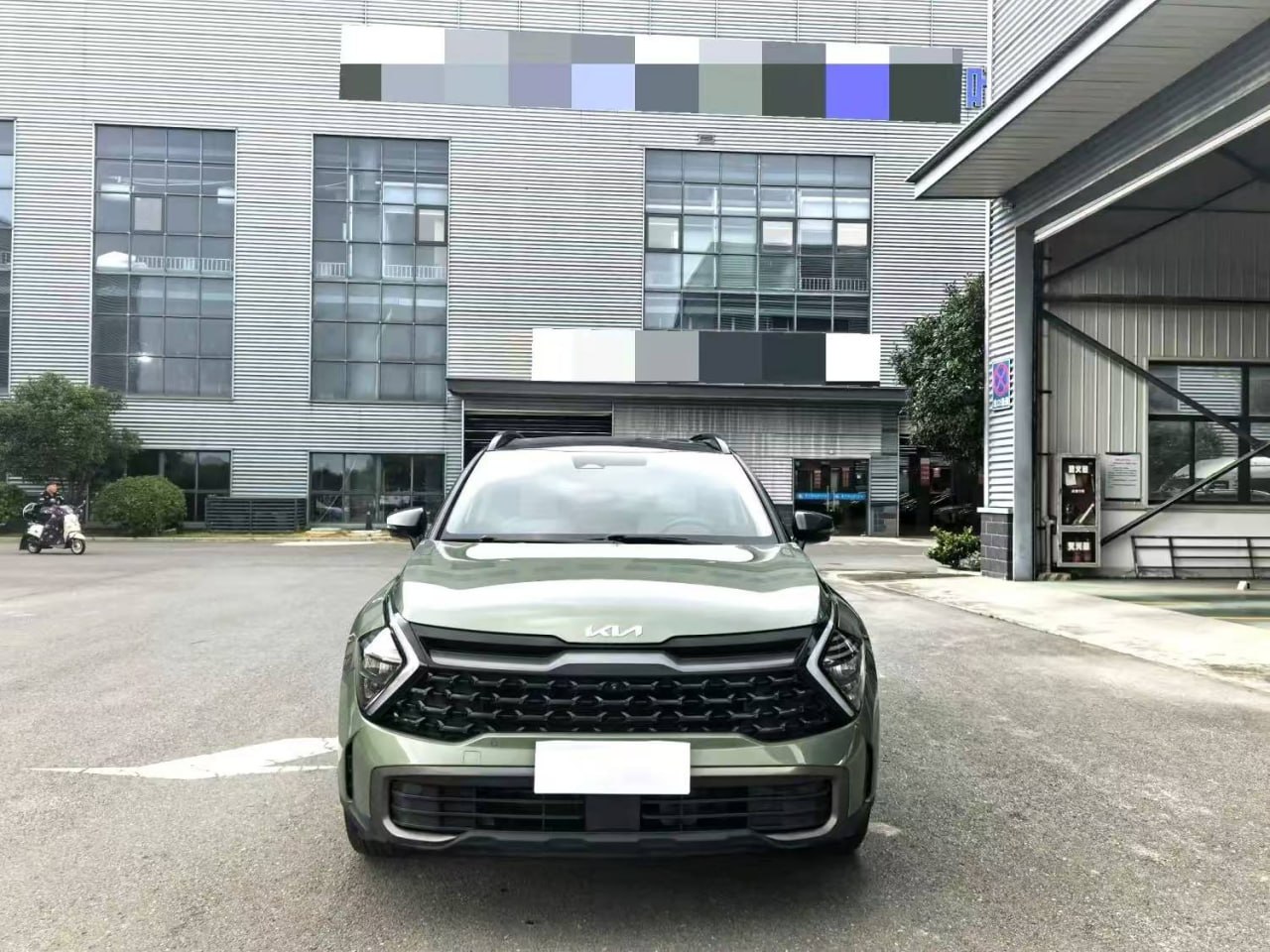 Kia Sportage HEV — Вид спереди